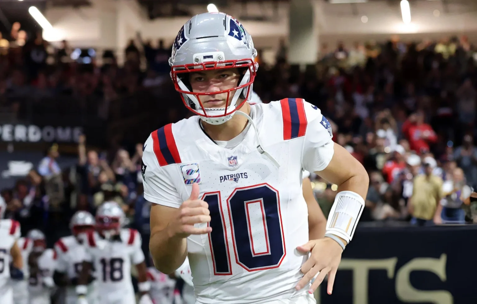 Drake Maye #10 of the New England Patriots takes on the field prior to the game against the New Orleans Saints at Caesars Superdome on October 12, 2025 in New Orleans, Louisiana.