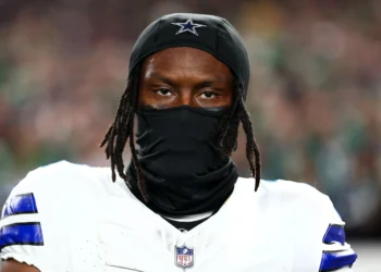 George Pickens #3 of the Dallas Cowboys stands on the sidelines during the national anthem prior to an NFL football game against the Philadelphia Eagles at Lincoln Financial Field in Philadelphia, Pennsylvania.