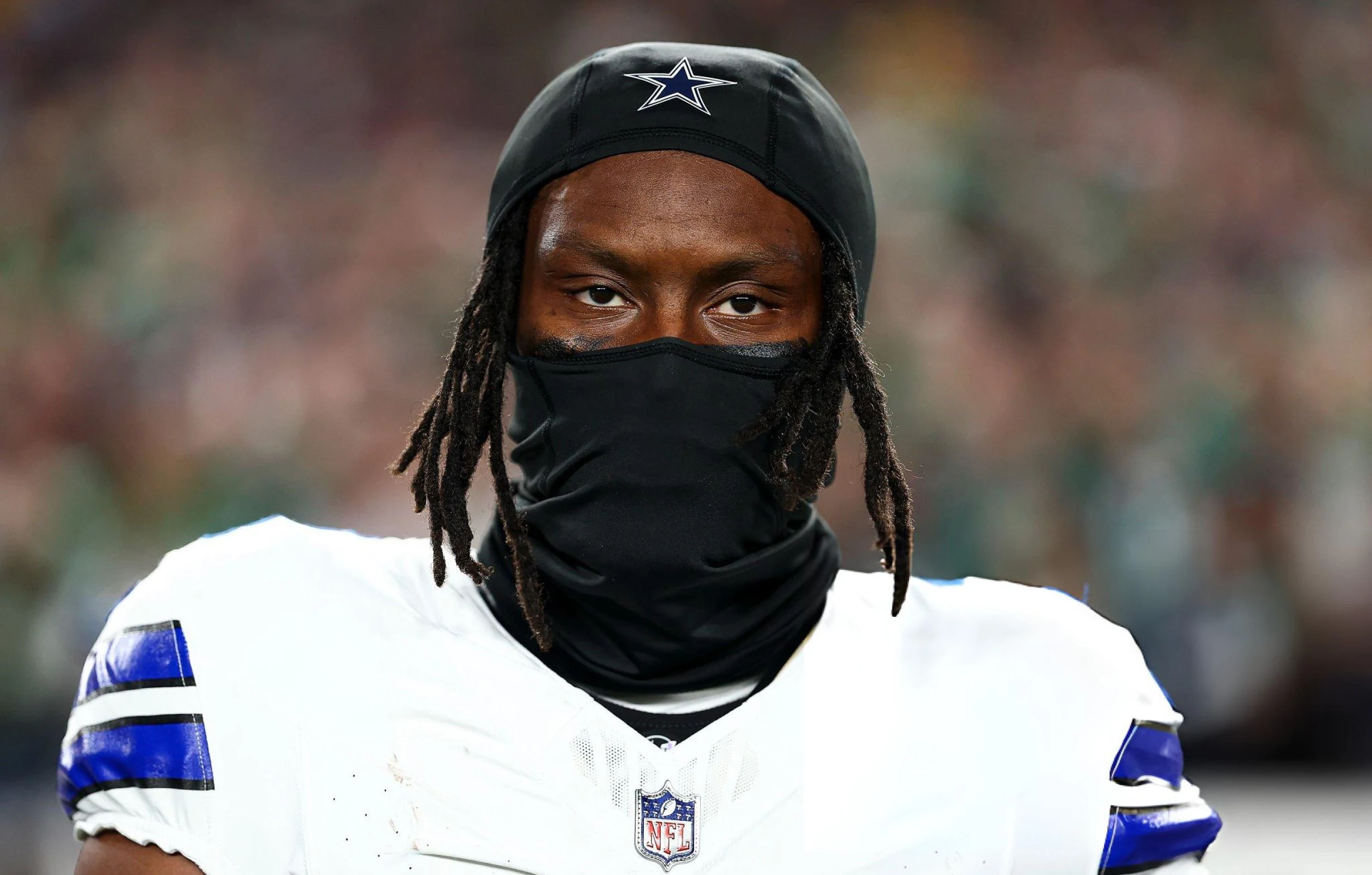 George Pickens #3 of the Dallas Cowboys stands on the sidelines during the national anthem prior to an NFL football game against the Philadelphia Eagles at Lincoln Financial Field in Philadelphia, Pennsylvania.