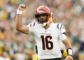Joe Flacco #16 of the Cincinnati Bengals reacts during the third quarter in the game against the Green Bay Packers at Lambeau Field in Green Bay, Wisconsin. (Photo by Michael Reaves/Getty Images)