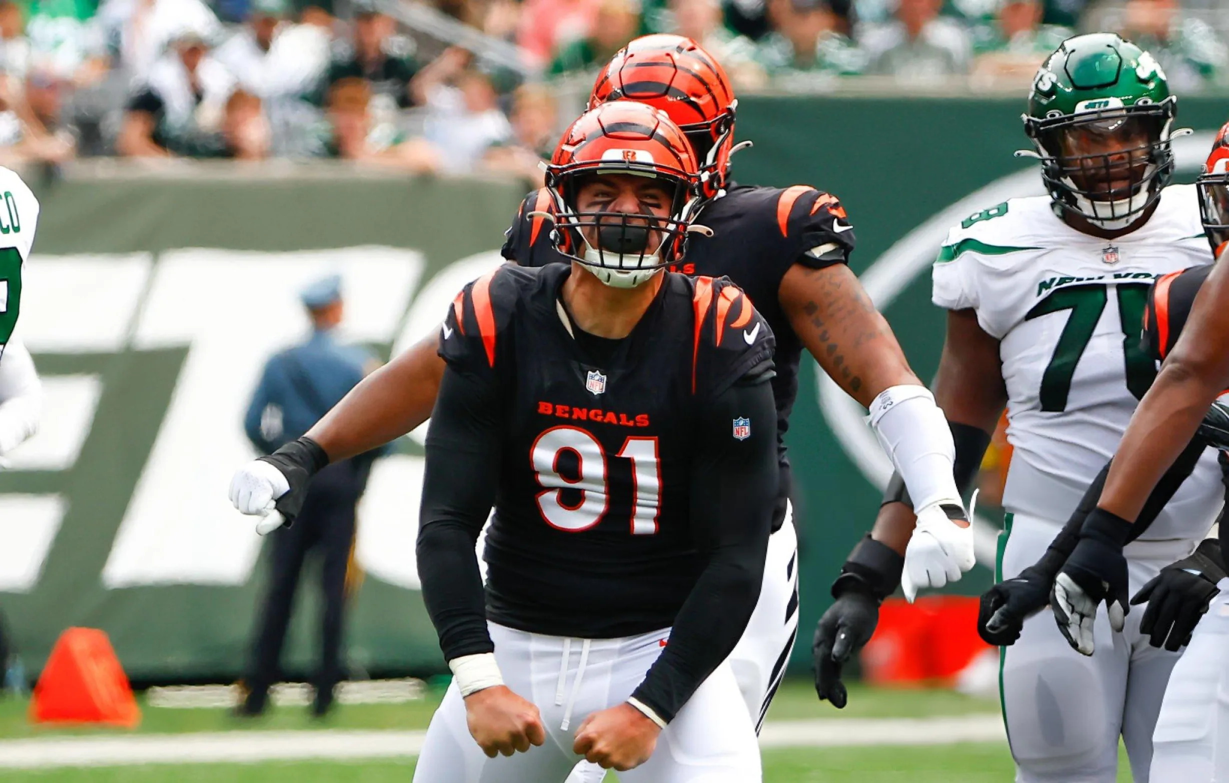 Cincinnati Bengals defensive end Trey Hendrickson (91) reacts after sacking New York Jets quarterback and causing a fumble during the National Football League game between the New York Jets and the Cincinnati Bengals at MetLife Stadium in East Rutherford, New Jersey.