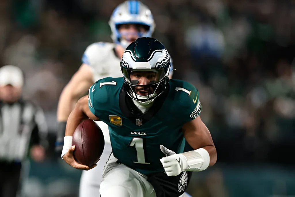 Jalen Hurts #1 of the Philadelphia Eagles runs with the ball during the second quarter against the Detroit Lions at Lincoln Financial Field on November 16, 2025 in Philadelphia, Pennsylvania.