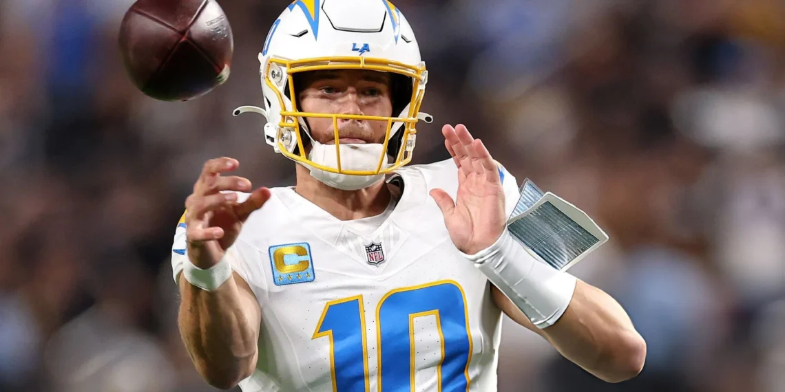 Justin Herbert #10 of the Los Angeles Chargers throws a pass against the Las Vegas Raiders during the first quarter at Allegiant Stadium in Las Vegas, Nevada. (Photo by Sean M. Haffey/Getty Images)