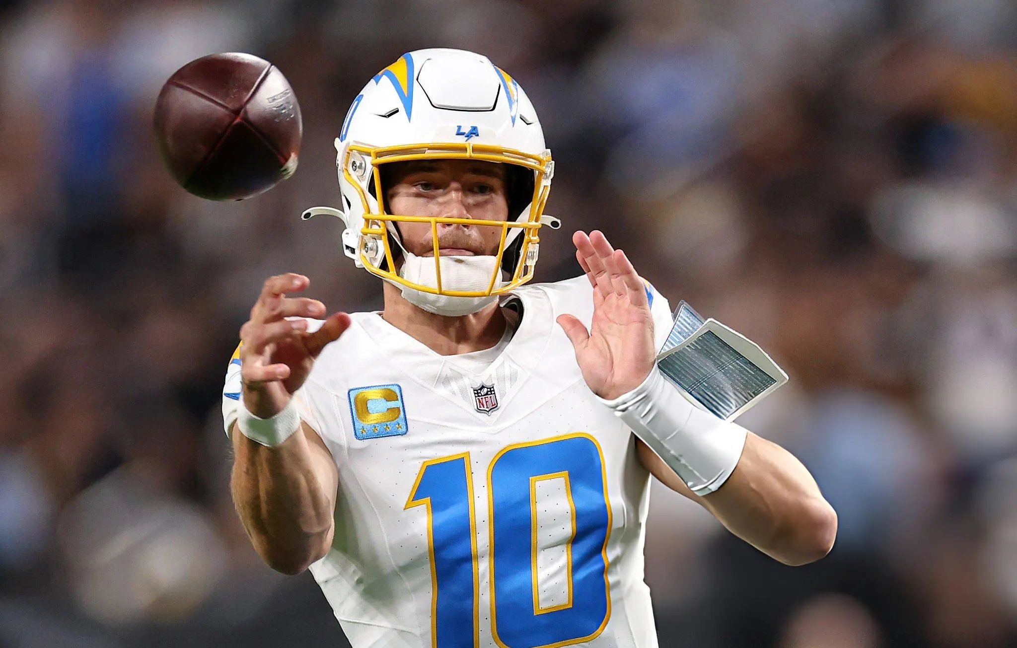 Justin Herbert #10 of the Los Angeles Chargers throws a pass against the Las Vegas Raiders during the first quarter at Allegiant Stadium in Las Vegas, Nevada. (Photo by Sean M. Haffey/Getty Images)