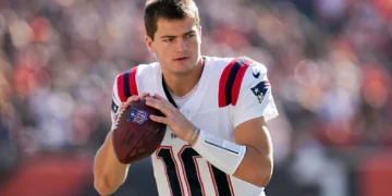 Drake Maye #10 of the New England Patriots warms up before the game against the Cincinnati Bengals at Paycor Stadium on November 23, 2025 in Cincinnati, Ohio. (Photo by Dylan Buell/Getty Images)