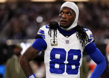 CeeDee Lamb #88 of the Dallas Cowboys stands on the sideline during the national anthem prior to the game against the Las Vegas Raiders at Allegiant Stadium on November 17, 2025 in Las Vegas, Nevada. (Photo by Brooke Sutton/Getty Images)