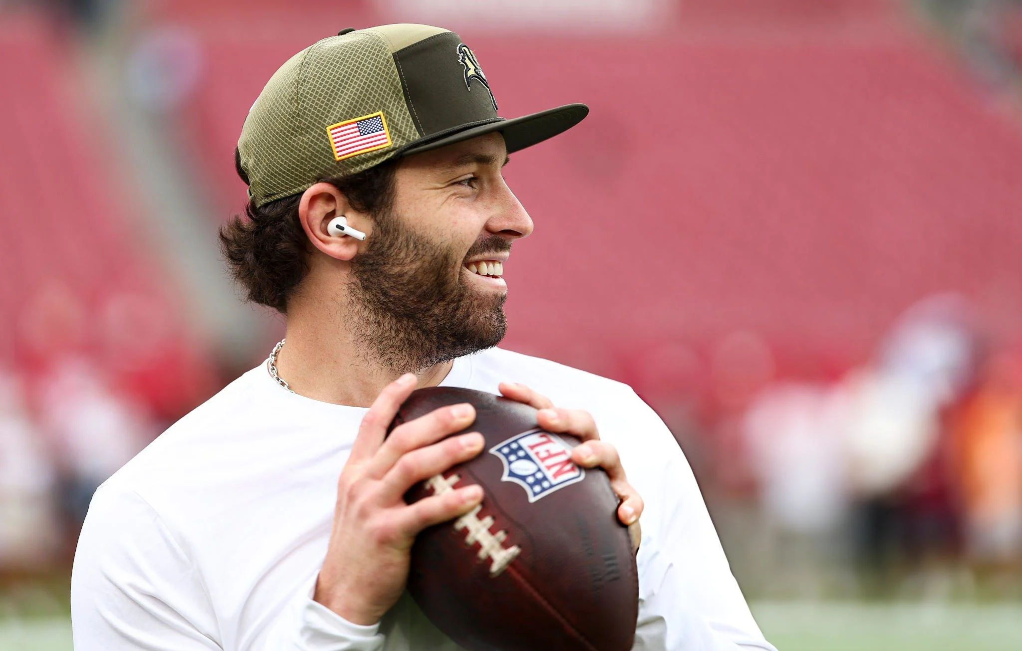 Baker Mayfield #6 of the Tampa Bay Buccaneers warms up wearing "Salute to Service" gear prior to an NFL football game against the New England Patriots at Raymond James Stadium on November 9, 2025 in Tampa, Florida.