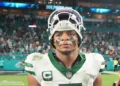 New York Jets quarterback Justin Fields (7) looks toward the stands following the game between the New York Jets and the Miami Dolphins on Monday, September 29, 2025 at Hard Rock Stadium in Miami, FL