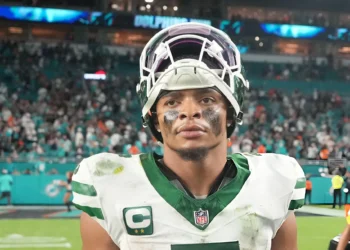 New York Jets quarterback Justin Fields (7) looks toward the stands following the game between the New York Jets and the Miami Dolphins on Monday, September 29, 2025 at Hard Rock Stadium in Miami, FL