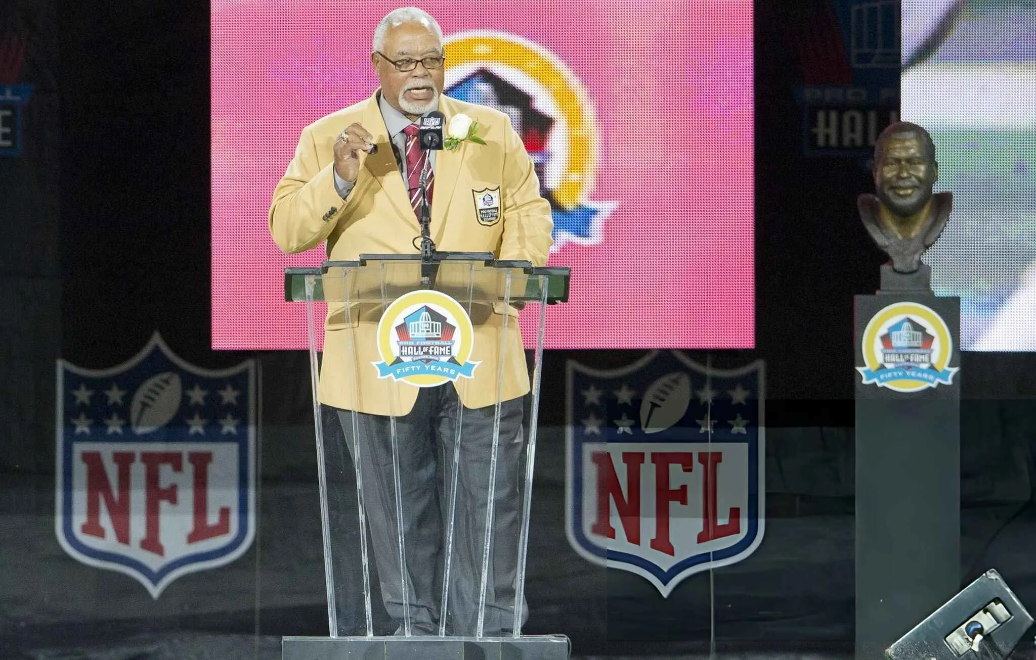 Former defender Curley Culp gives his speech during the NFL Class of 2013 Enshrinement Ceremony at Fawcett Stadium on Aug. 3, 2013 in Canton, Ohio. (Photo by Jason Miller/Getty Images)
