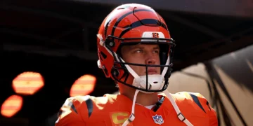 Joe Burrow #9 of the Cincinnati Bengals prepares to run out to the field prior to the start of the NFL 2025 game against the Jacksonville Jaguars at Paycor Stadium on September 14, 2025 in Cincinnati, Ohio. (Photo by Kirk Irwin/Getty Images)