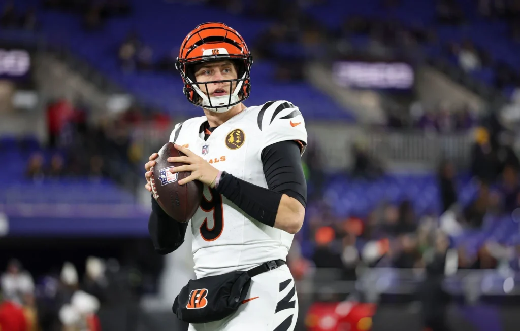 Joe Burrow #9 of the Cincinnati Bengals throws a pass during warm ups prior to an NFL football game against the Baltimore Ravens at M&T Bank Stadium on November 27, 2025 in Baltimore, Maryland. (Photo by Logan Bowles/Getty Images)