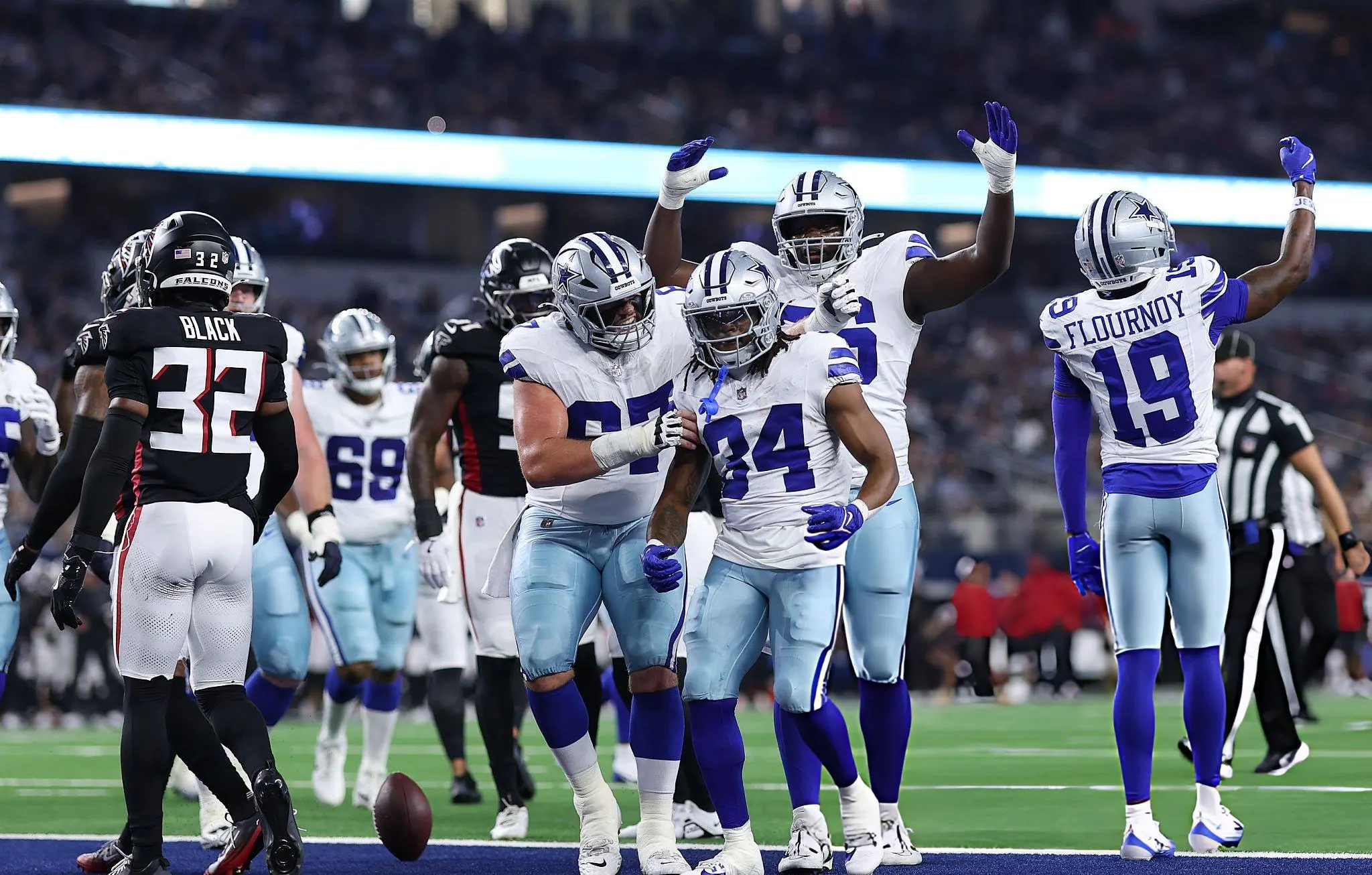 Jaydon Blue #34 of the Dallas Cowboys celebrates with teammates after scoring a touchdown during the first half of the NFL Preseason 2025 game against the Atlanta Falcons at AT&T Stadium. (Photo by Sam Hodde/Getty Images)