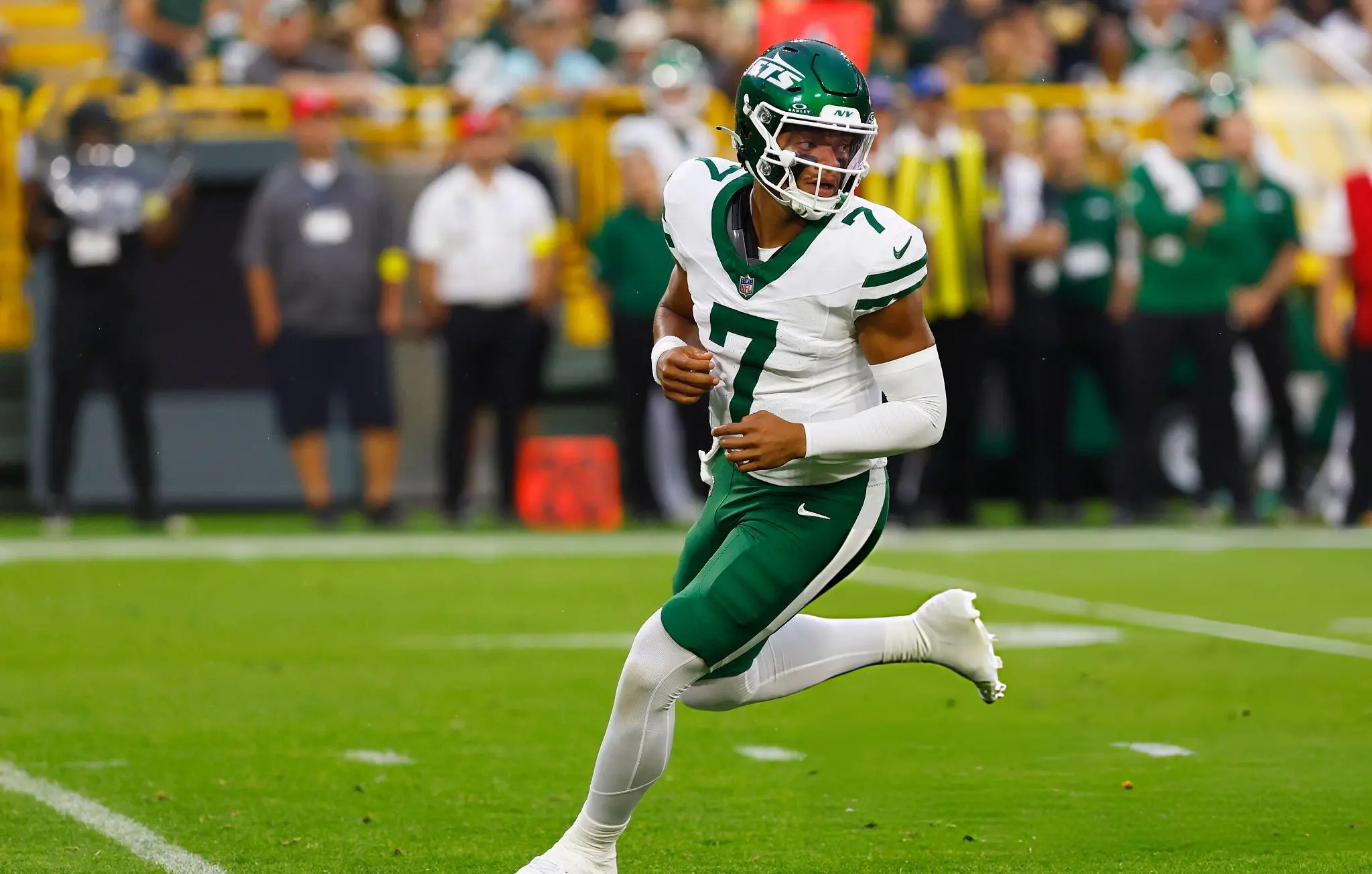 New York Jets quarterback Justin Fields (7) watches a play during a game between the Green Bay Packers and the New York Jets at Lambeau Field on August 9, 2025 in Green Bay, WI.