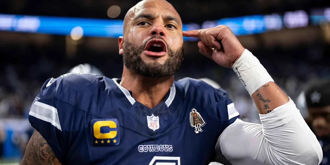 Dak Prescott #4 of the Dallas Cowboys reacts as he leads a huddle prior to an NFL football game against the Detroit Lions at Ford Field