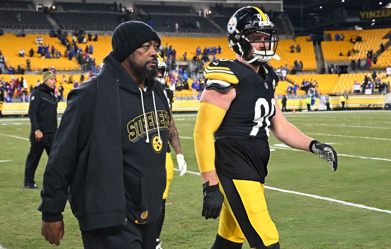 Head coach Mike Tomlin and T.J. Watt of the Pittsburgh Steelers