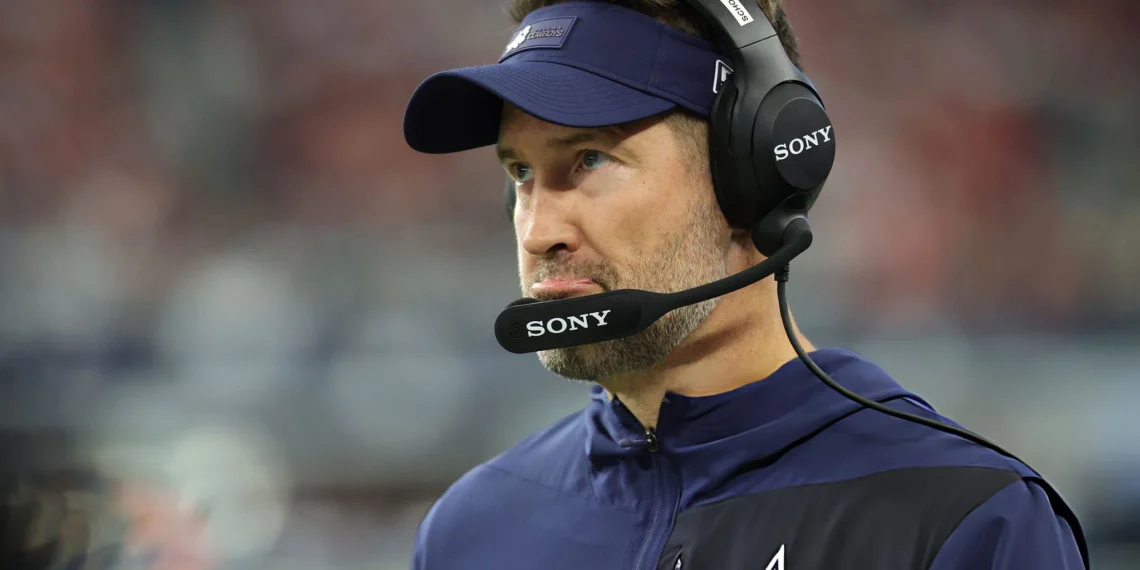 Head coach Brian Schottenheimer of the Dallas Cowboys looks on during the first quarter against the Kansas City Chiefs in the game at AT&T Stadium on November 27, 2025 in Arlington, Texas.