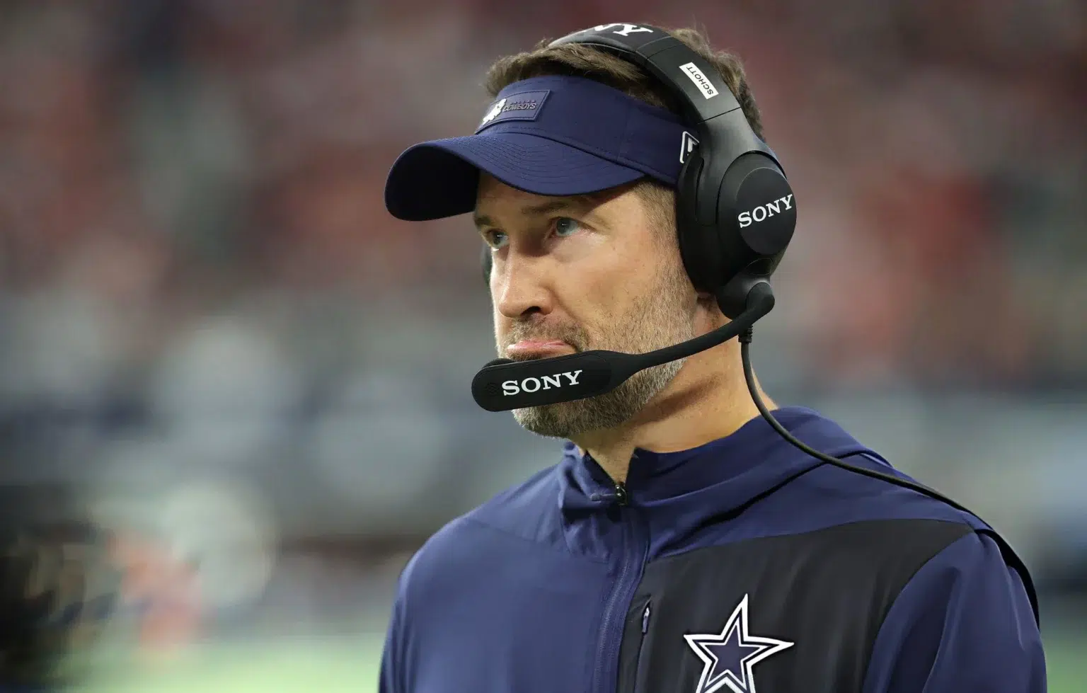Head coach Brian Schottenheimer of the Dallas Cowboys looks on during the first quarter against the Kansas City Chiefs in the game at AT&T Stadium on November 27, 2025 in Arlington, Texas.