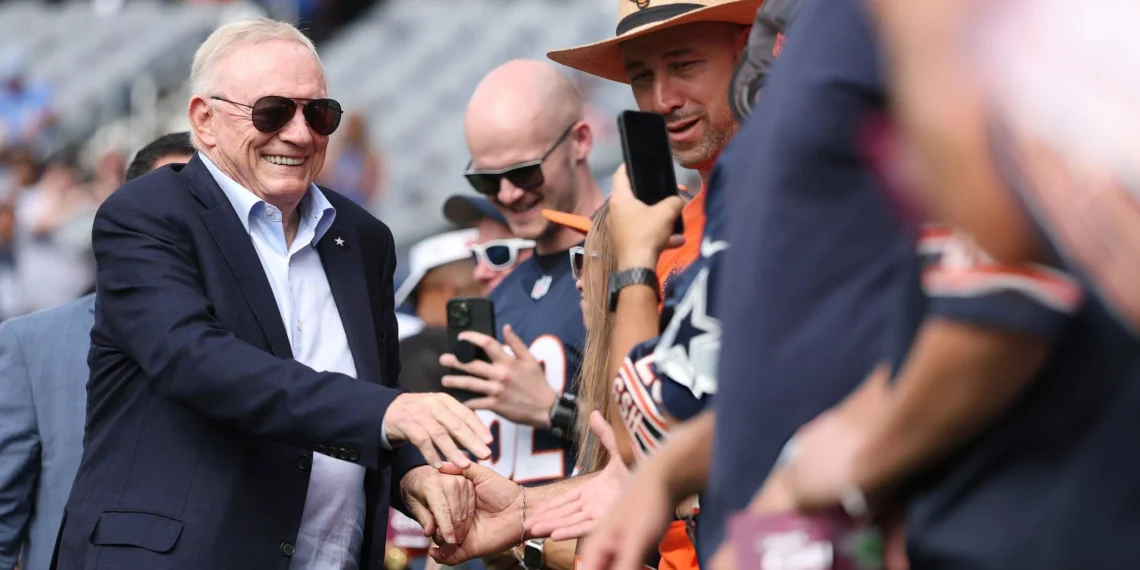 Owner Jerry Jones of the Dallas Cowboys shakes hand with fans before the game against the Chicago Bears at Soldier Field on September 21, 2025 in Chicago, Illinois.