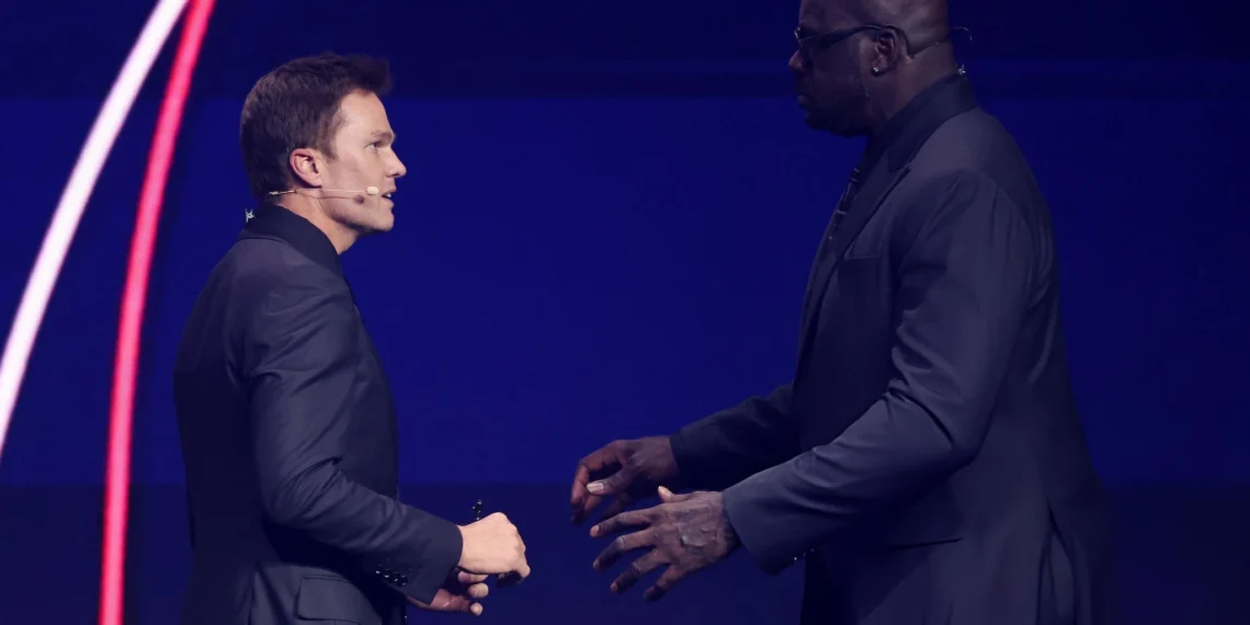 Draw assistant Shaquille O’Neal greets Draw assistant Tom Brady during the FIFA World Cup 2026 Official Draw