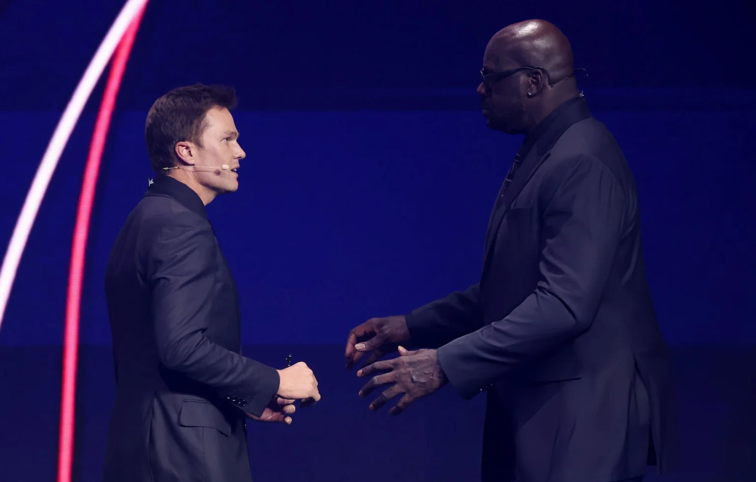 Draw assistant Shaquille O’Neal greets Draw assistant Tom Brady during the FIFA World Cup 2026 Official Draw