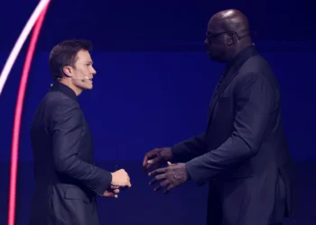 Draw assistant Shaquille O’Neal greets Draw assistant Tom Brady during the FIFA World Cup 2026 Official Draw