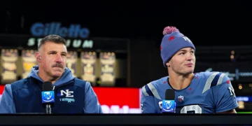 Drake Maye #10 of the New England Patriots and New England Patriots head coach Mike Vrabel visit on set of the TNF on Prime